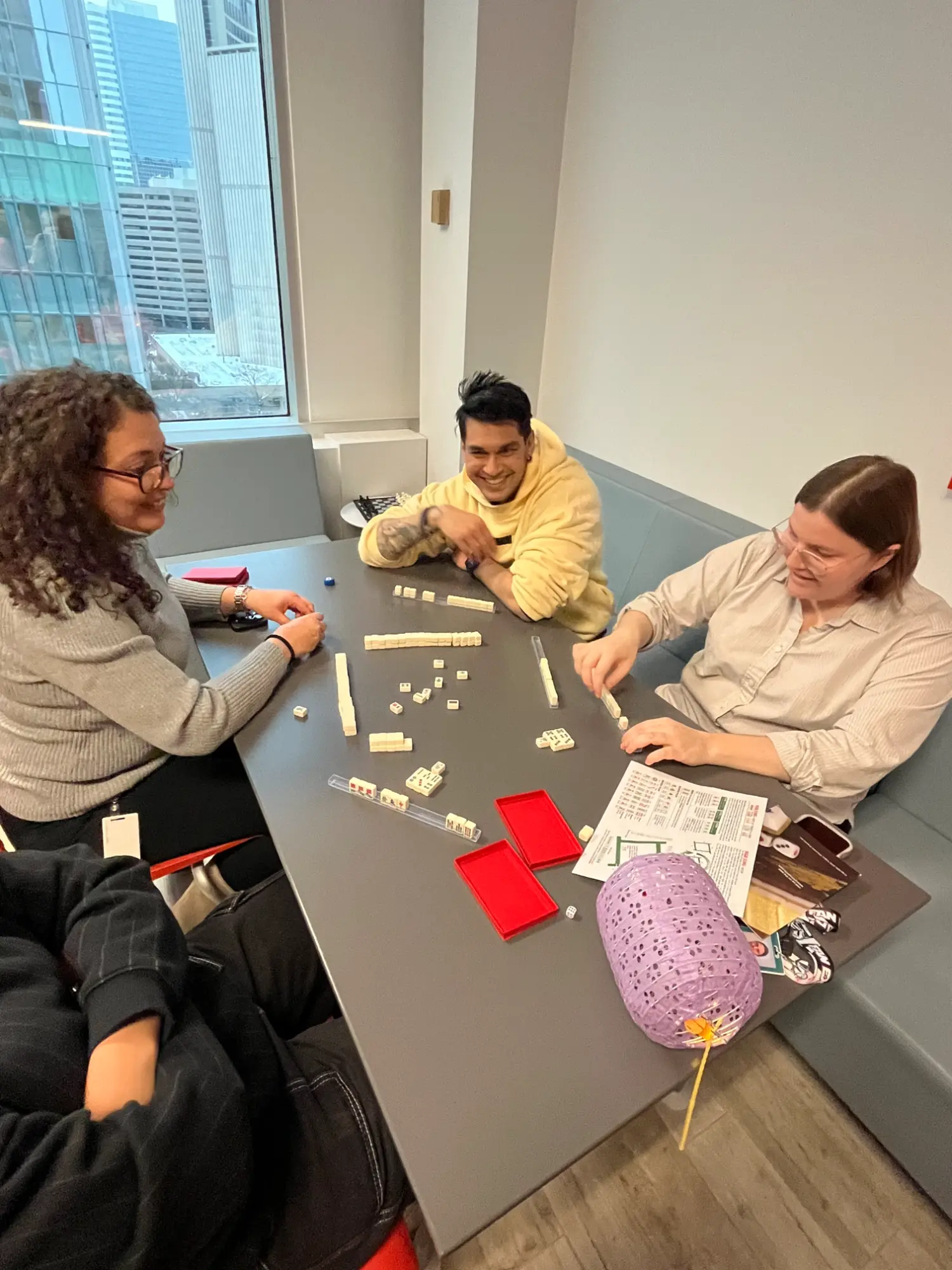 Lunar New Year celebrations. Employees playing Mahjong