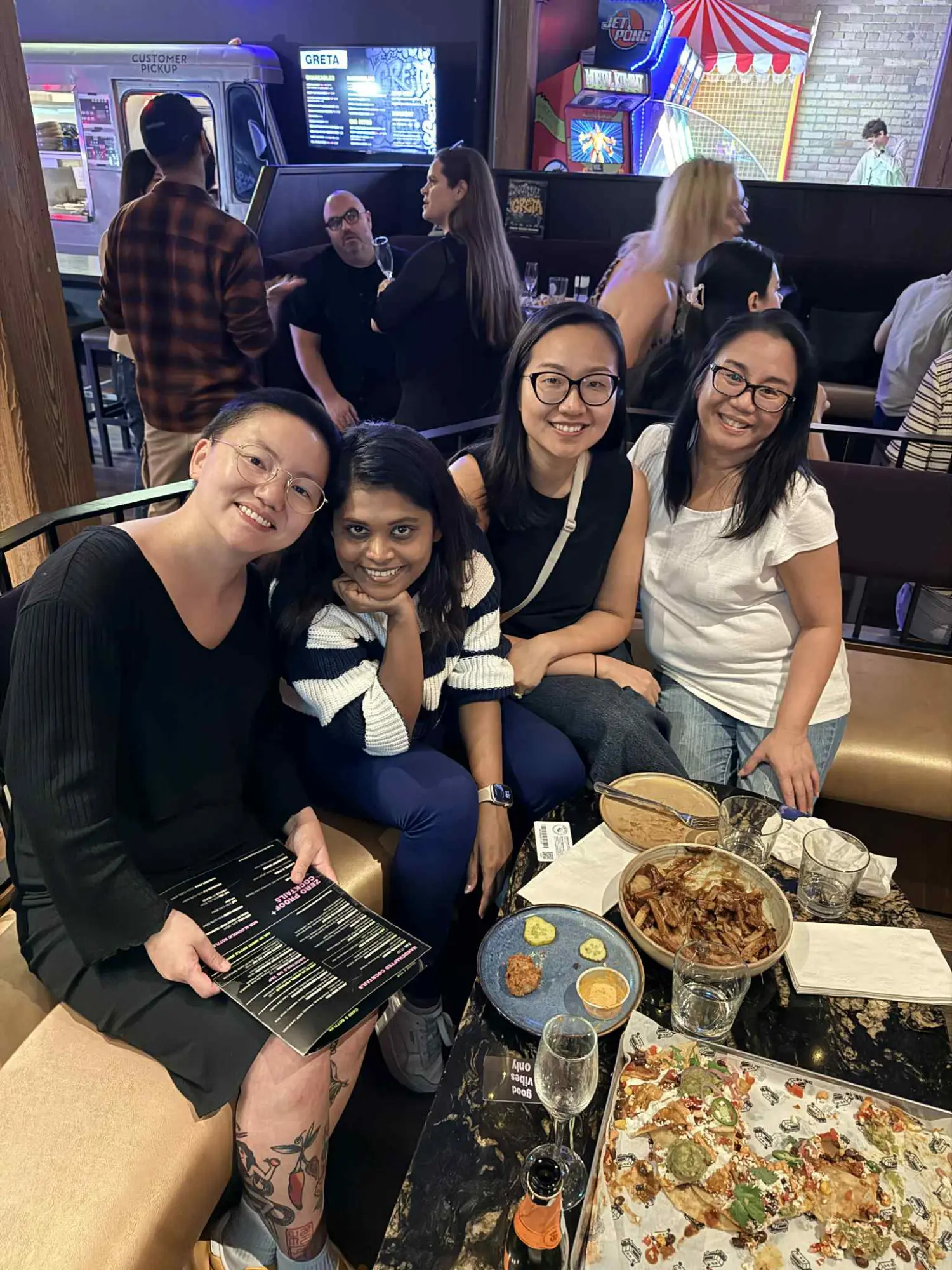 A couple leadership team members and employees enjoying the social part of our offsite day.