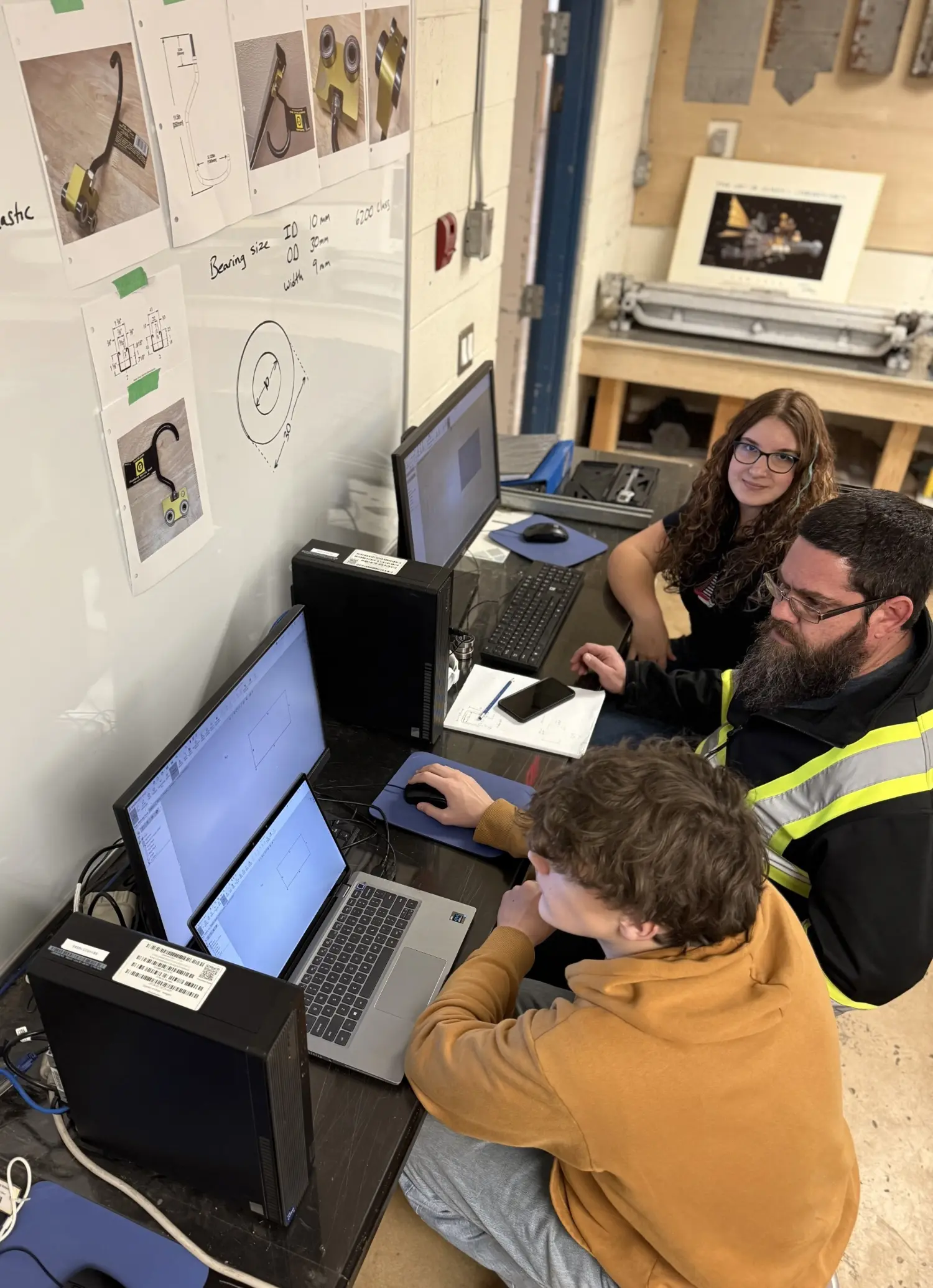 Community Programs include mentorship in local high schools, donations of equipment - mills, lathes, 3D printer, laptops