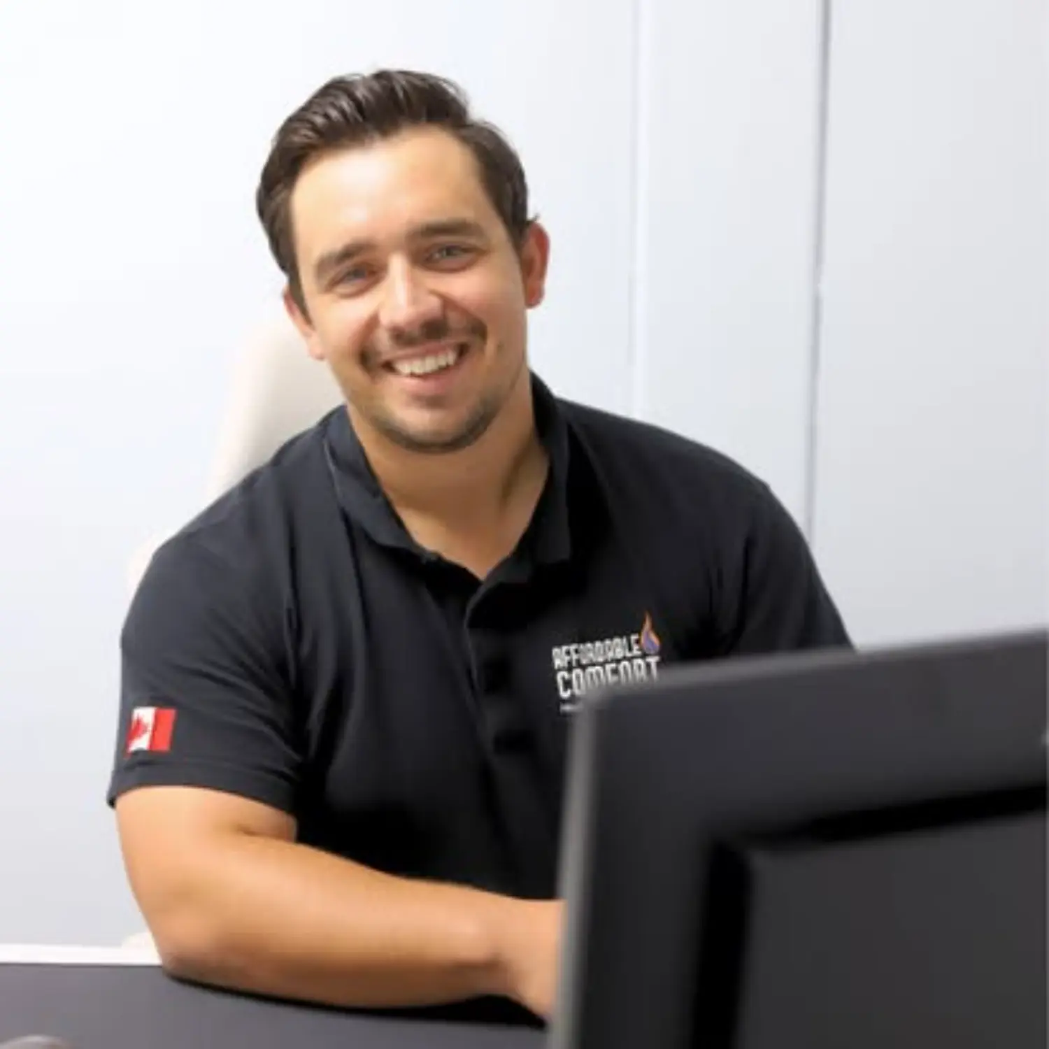 Friendly team member providing support from our office.