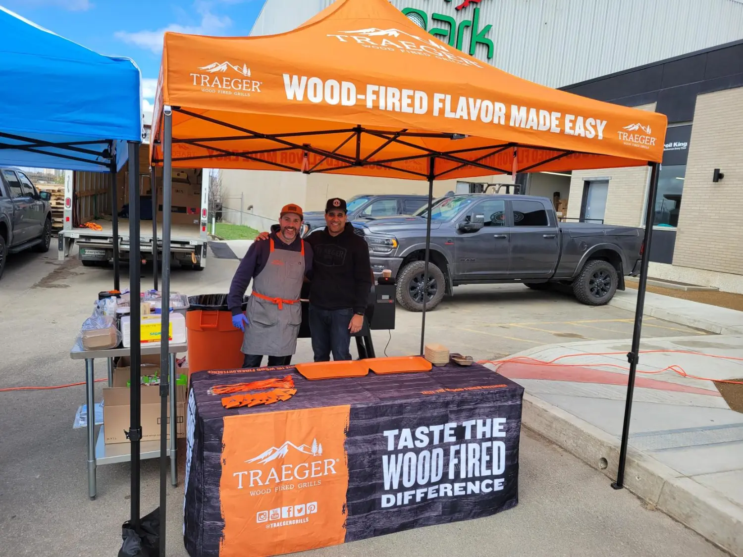 Our team serving samples off the Traeger at a local BBQ store grand opening.