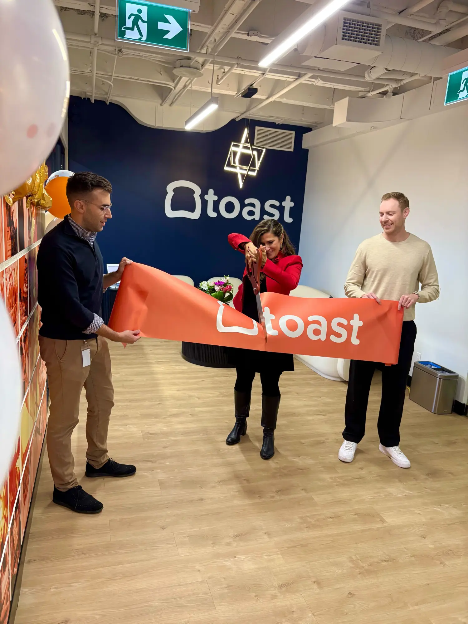 Celebrating the official opening of our Toronto office with a celebratory ribbon cutting ceremony.