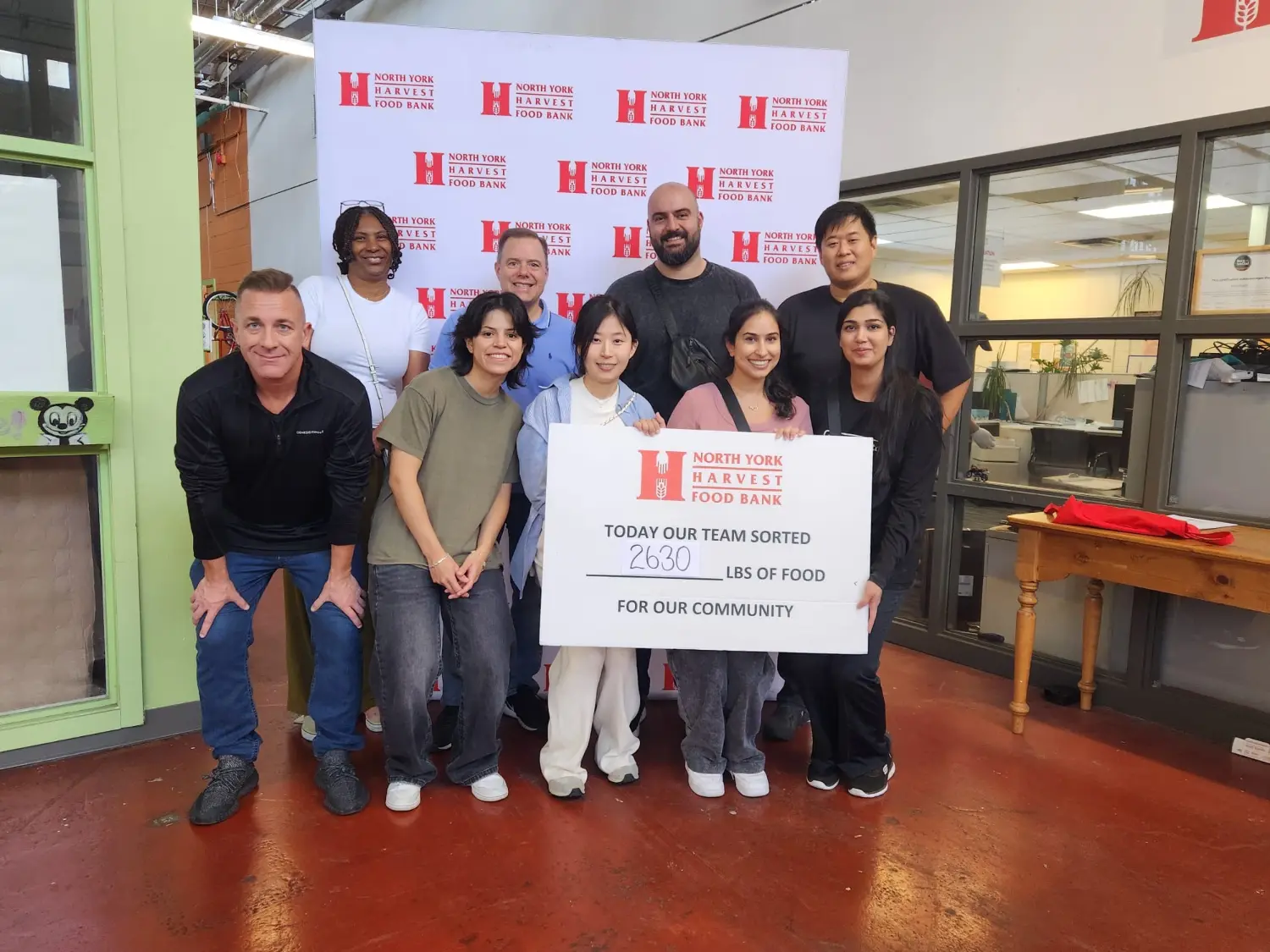 Employees-finishing-a-shift-sorting-food-donations-at-the-North-York-Harvest-Food-Bank