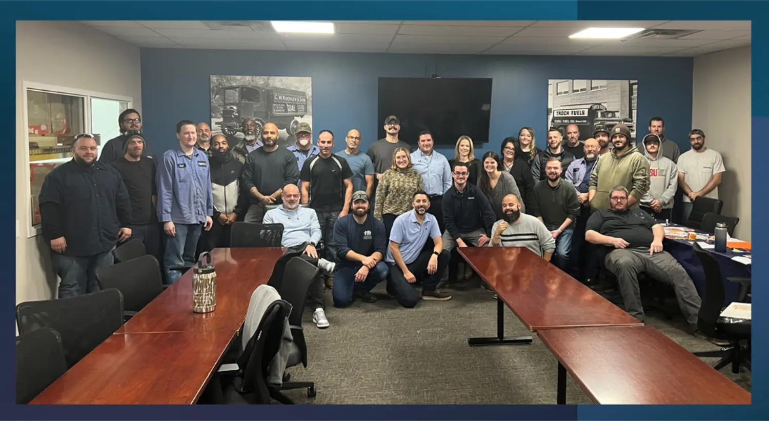 Our Maple Shade upfit team at a monthly engagement meeting for business updates and team bonding.