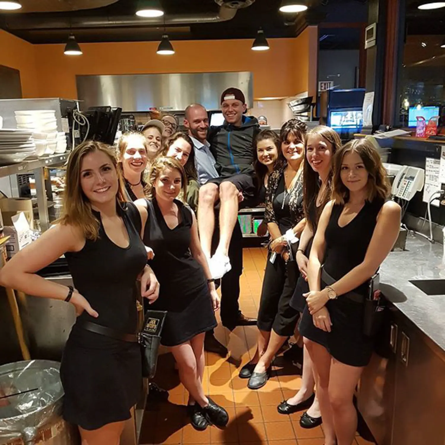 Lifting each other up - literally!' - A fun moment that captures the energy and unity of our restaurants.