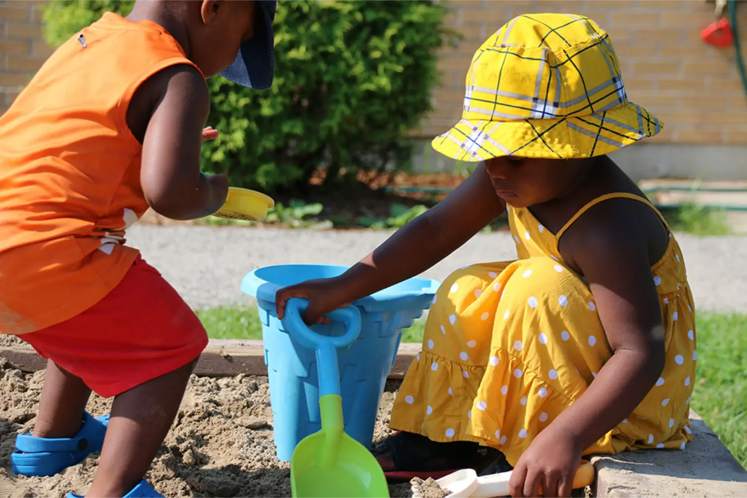 Outdoor play in the summertime encourages children to learn new creative skills and connect to the natural environment.