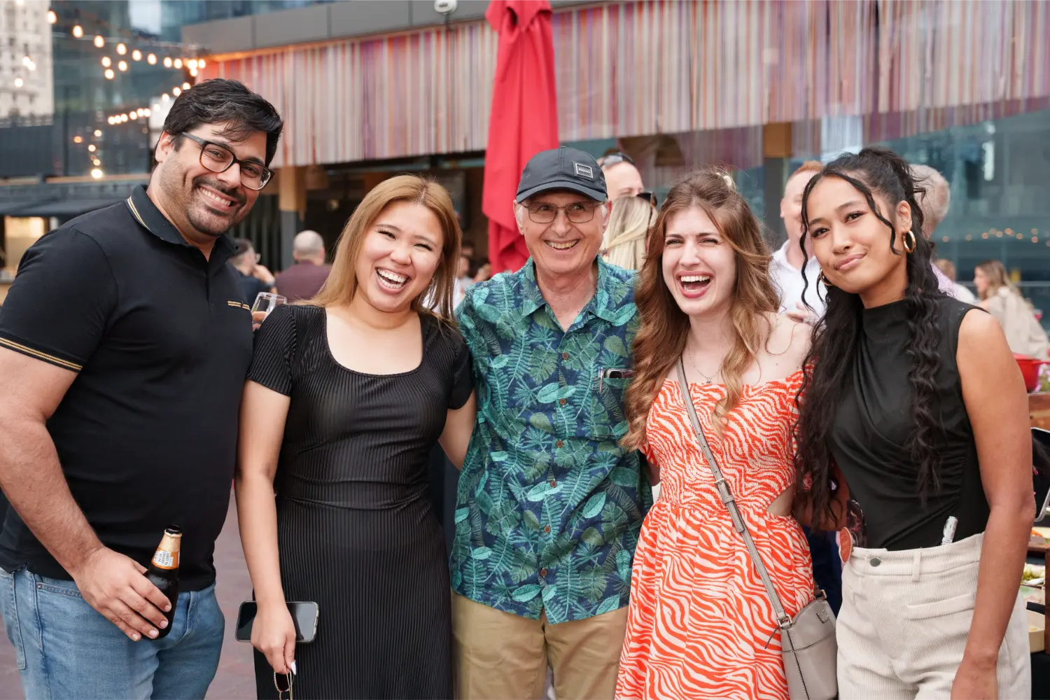 Andy with some team members at our Summer Social! Beautiful rooftop patio to kick-off the summer season!