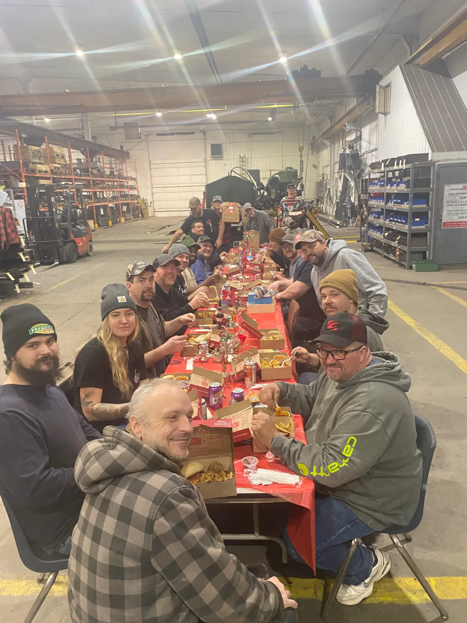 The Keswick team enjoying a winter picnic in the shop after a good week of work