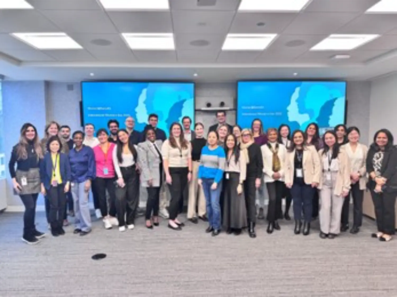 Group photo from an event held by our employee resource group, Women at Swiss Re.
