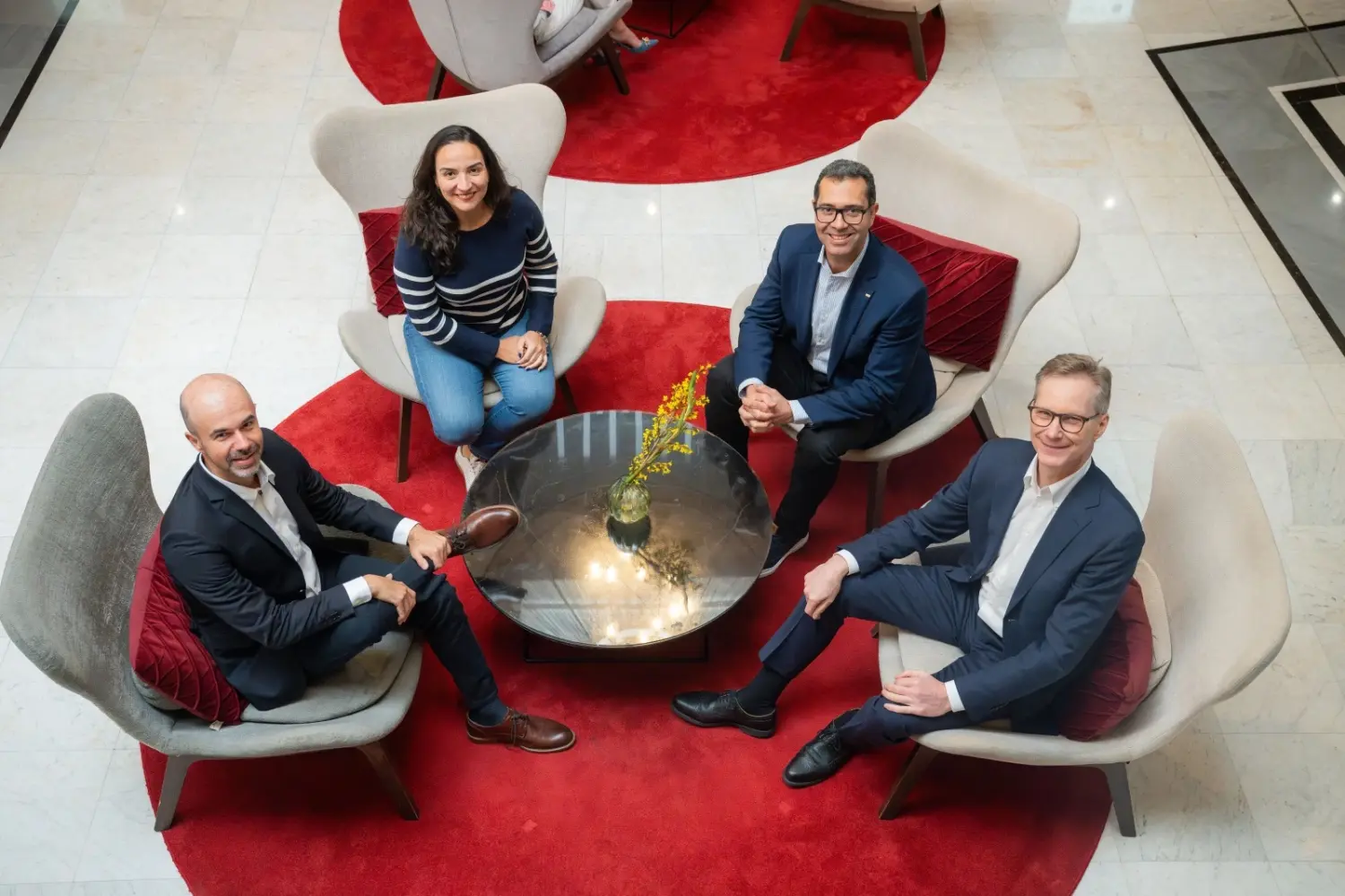 Aloysio Ribeiro Neto, Fernanda dos Santos Rodrigues, Marco Santos (Global CEO), and Dr. Jochen Ruetz