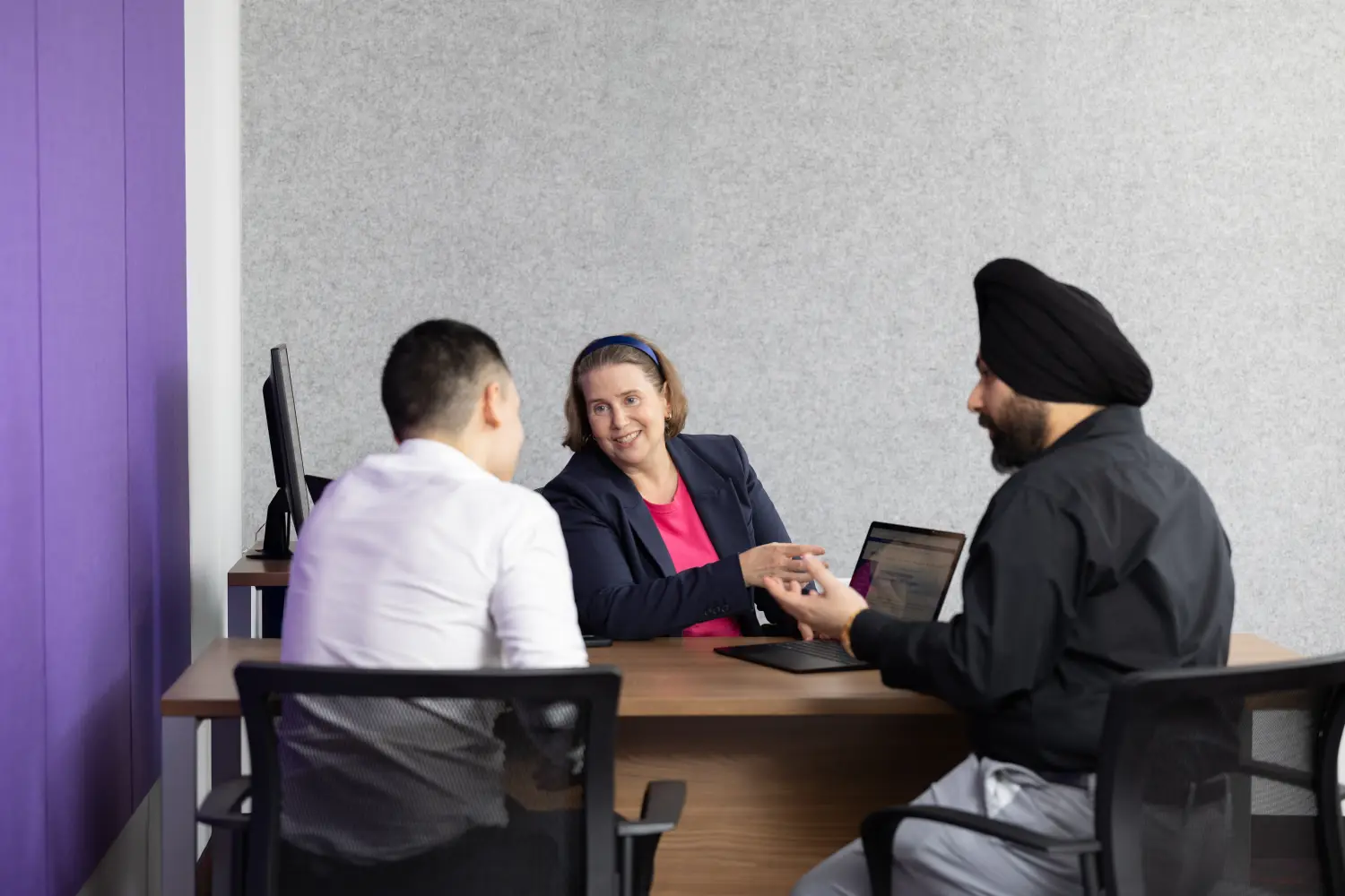 Colleagues spark creativity and drive solutions during a lively meeting.