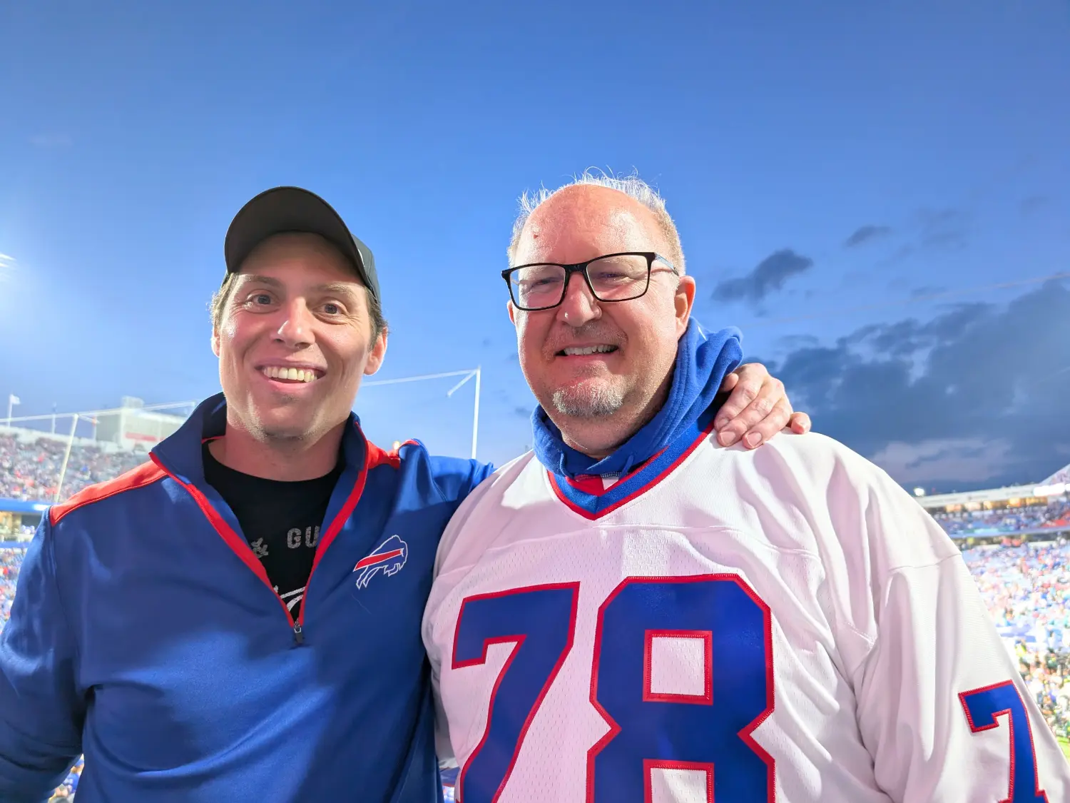 Our top business analysts are all smiles at a local football game