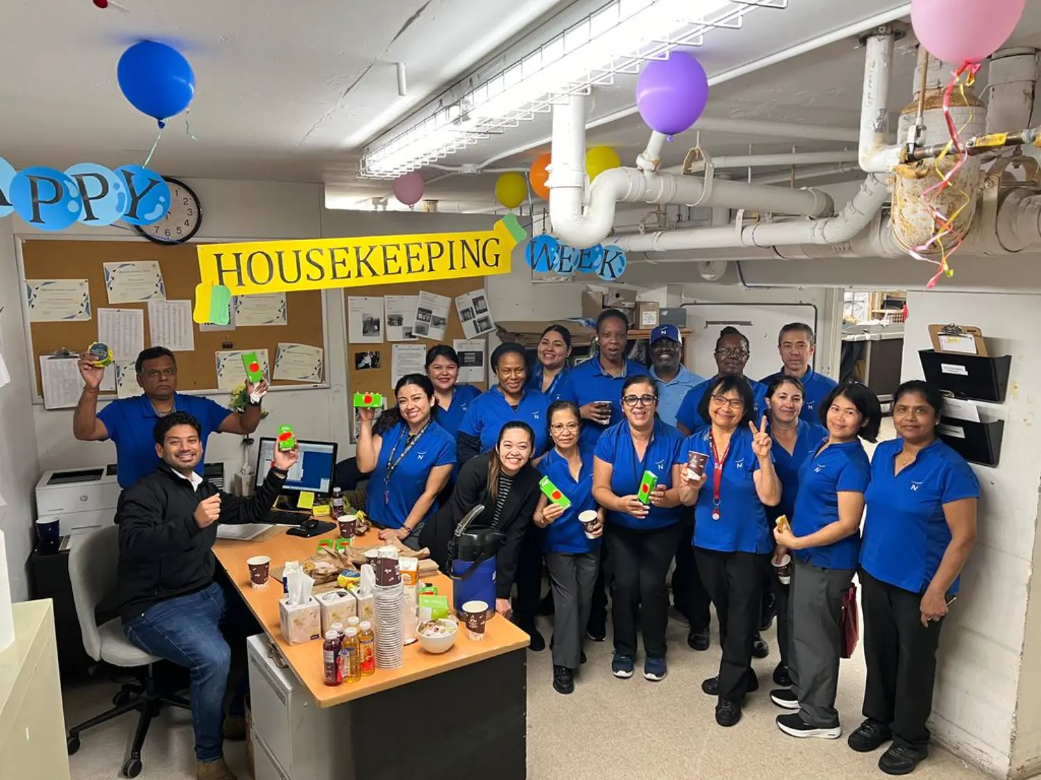 The team at Novotel Toronto Centre celebrating housekeeping week with coffee and treats.