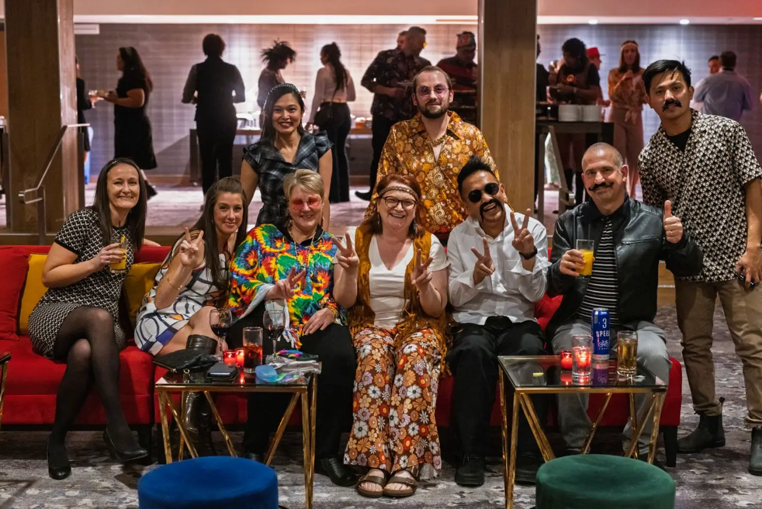 Team members nationwide dressed in 60s attire for a fun-filled evening at our Leadership Conference.