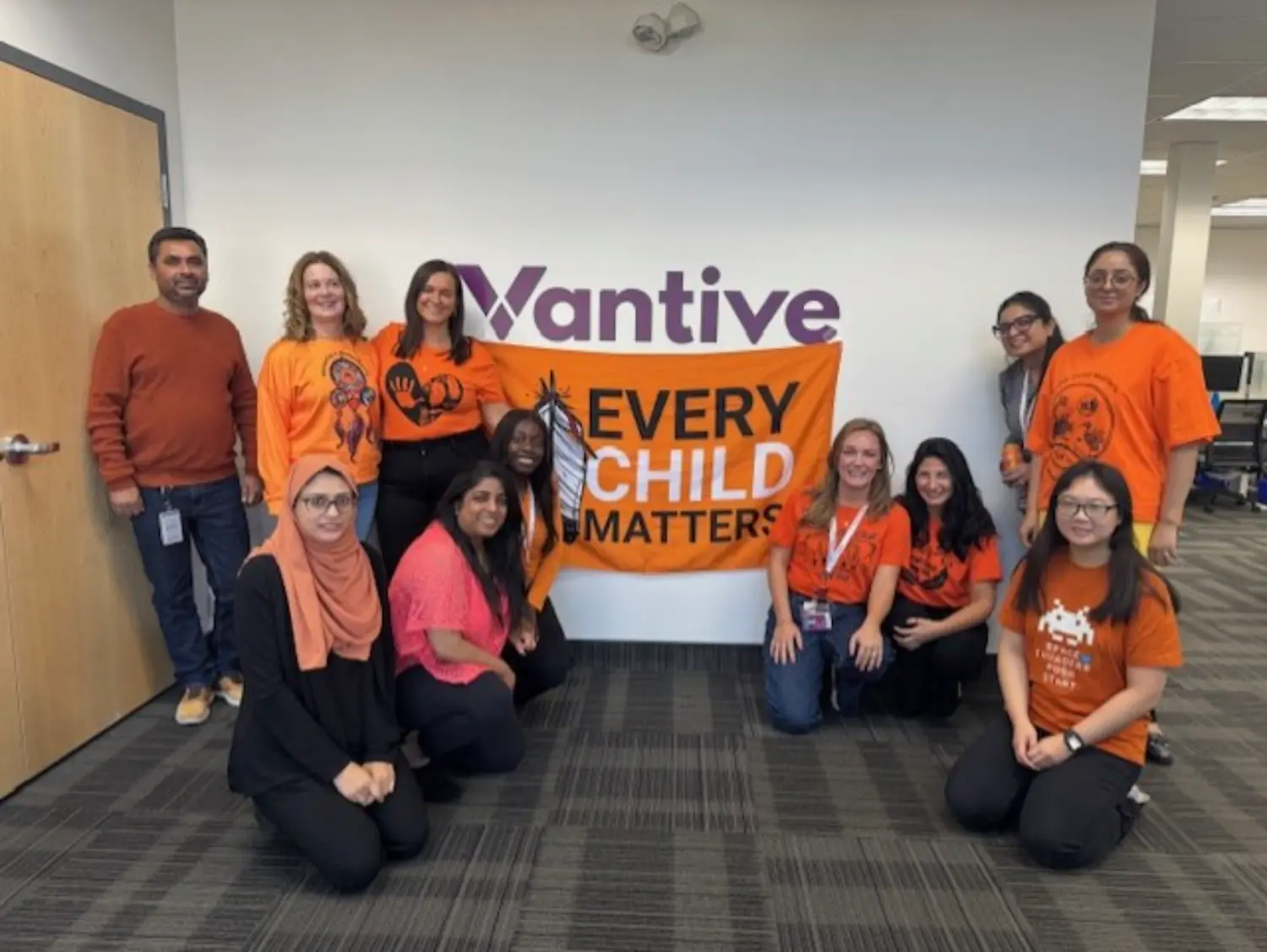 Wearing orange in recognition of the National Day for Truth and Reconciliation honouring, remembering, and reflecting to