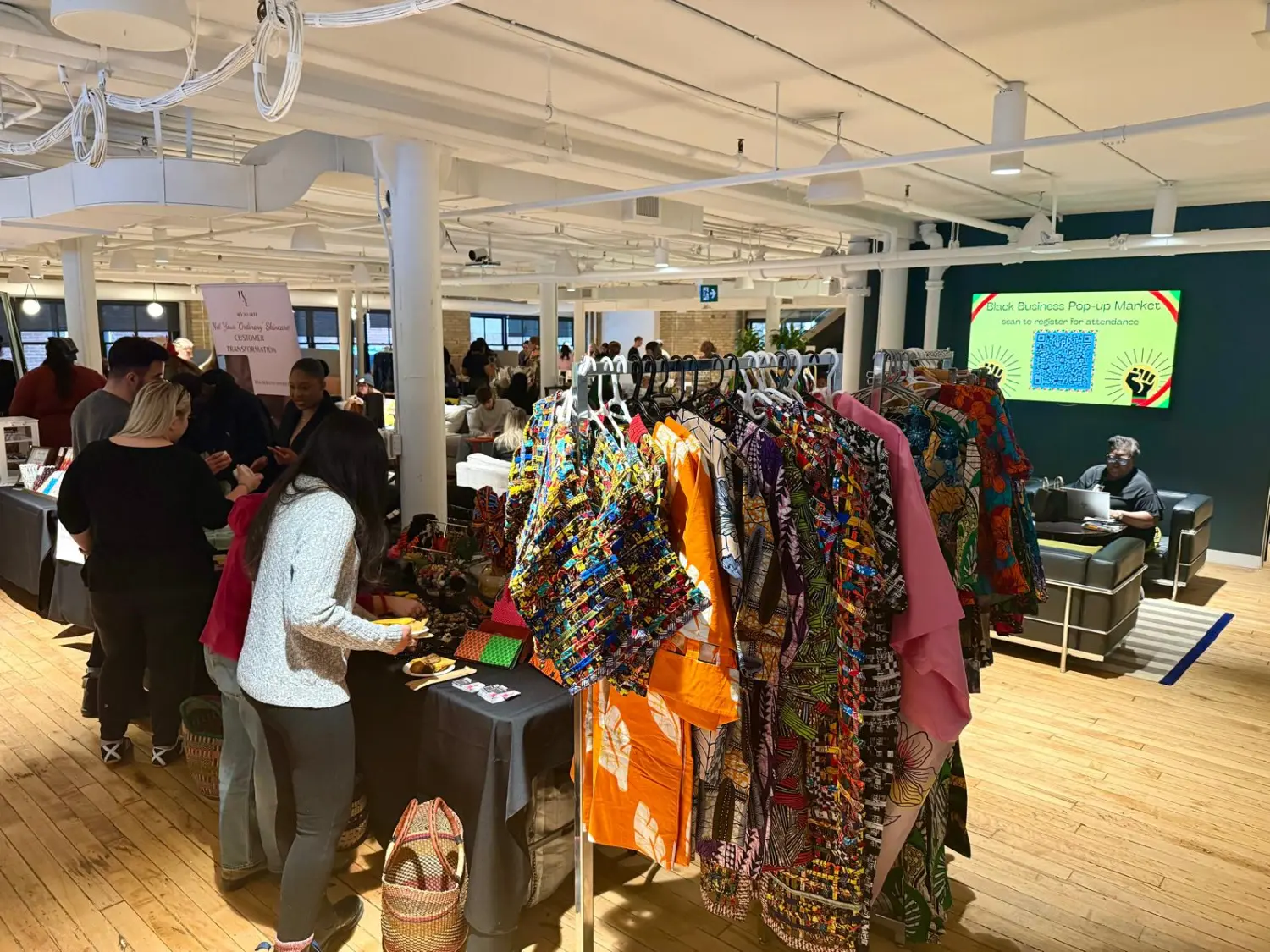 Employees taking part in a Black owned vendor pop up market hosted by DEI team for Black History Month