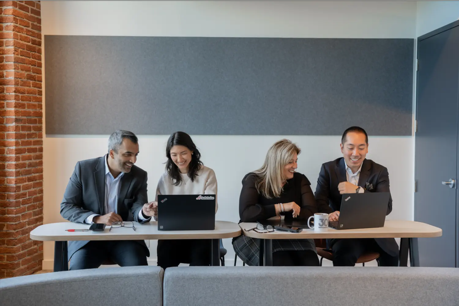 Team members collaborating and connecting at our Montreal office.