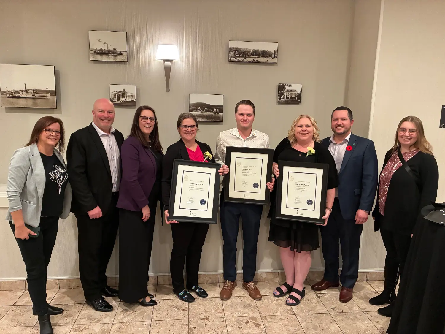 Celebrating a significant educational achievement by three of our teammates.