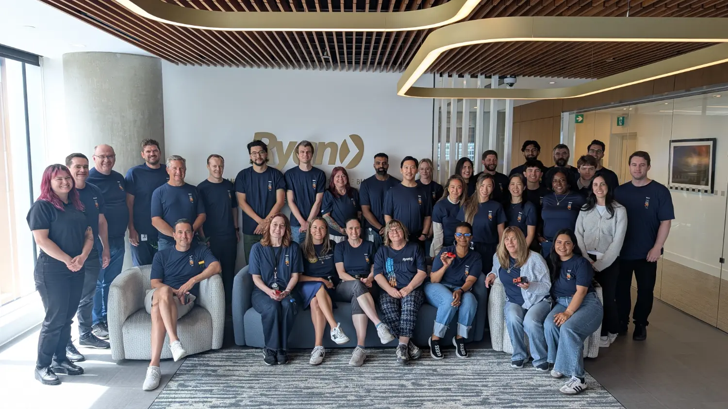Ryan Vancouver team members gather for a group photo after RyanSHARES Day.