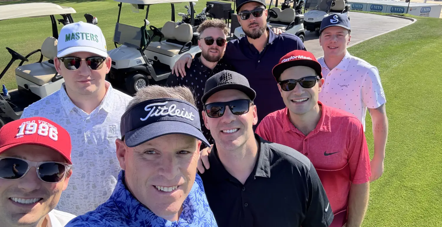 Our top earners in Sales celebrating during a round of golf!