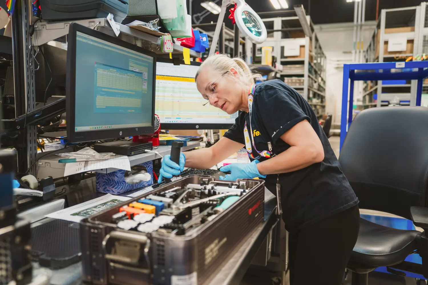 Stryker employee quality checking a surgical kit