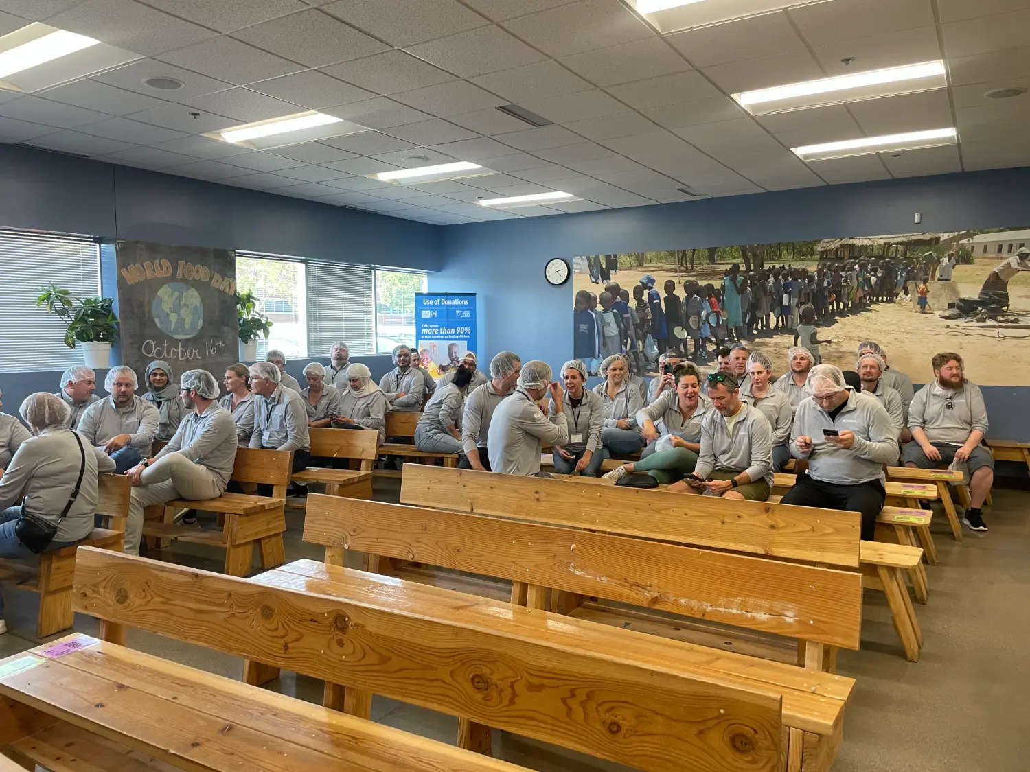 Preparing to pack meals at Feed My Starving Children