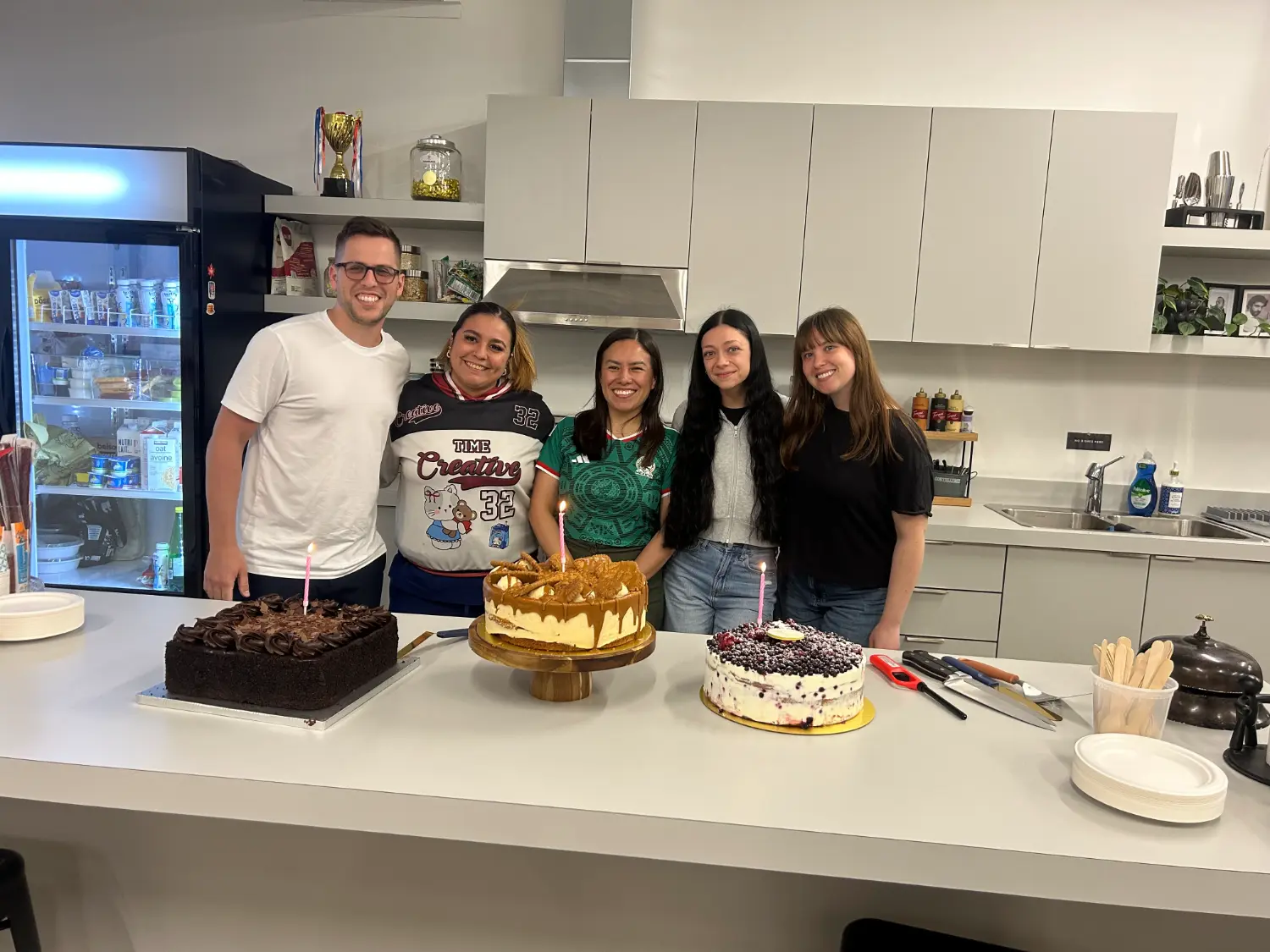 A sweet tradition: celebrating employee birthdays every month with cake and decorations and by spinning the gift wheel!