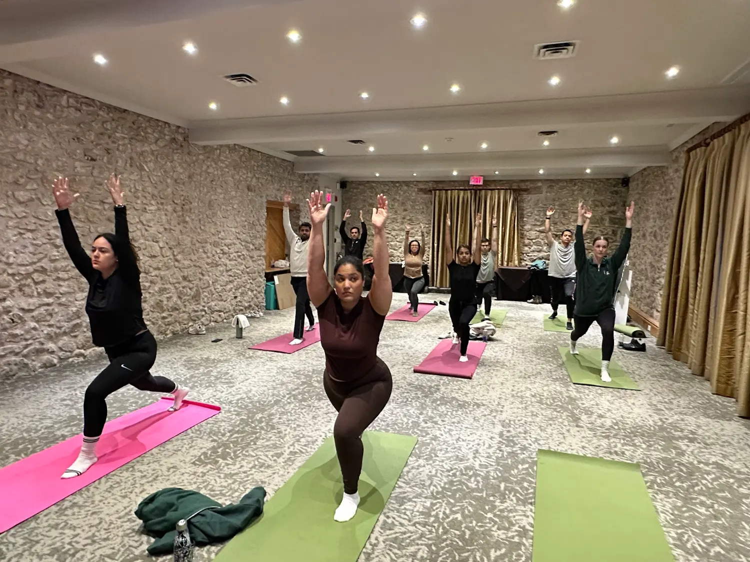 Fig employees enjoying a yoga class during our Fig offsite in Oct. 2025 in Caledon, Ont.