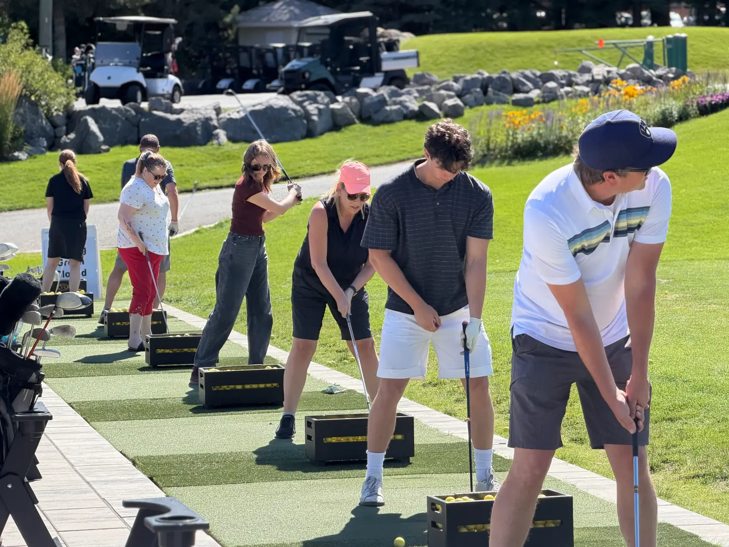 As part of our quarterly wellness programming, we headed to the range for golf lessons.