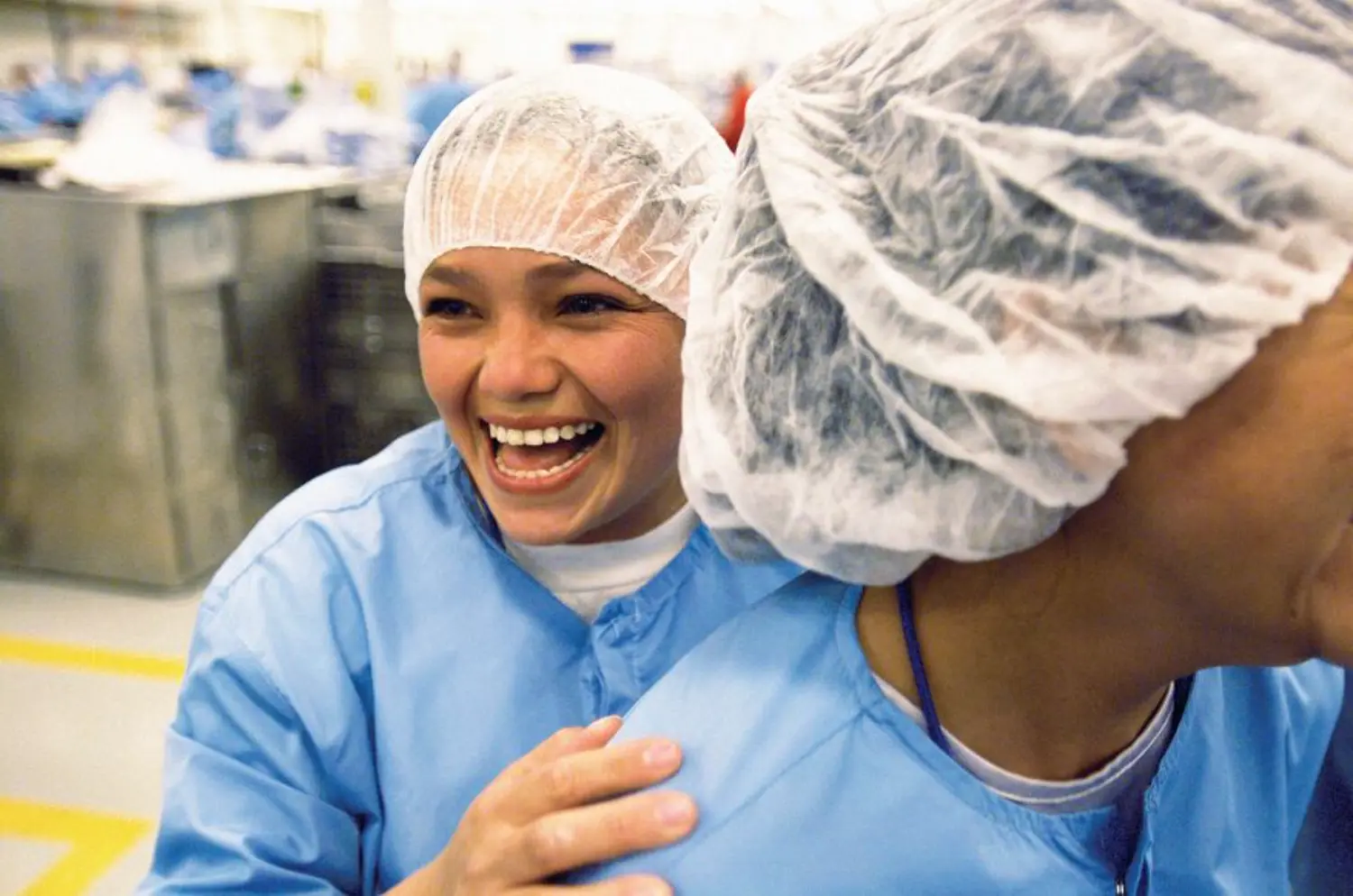 Employees at Convertors drape and gown manufacturing facility
