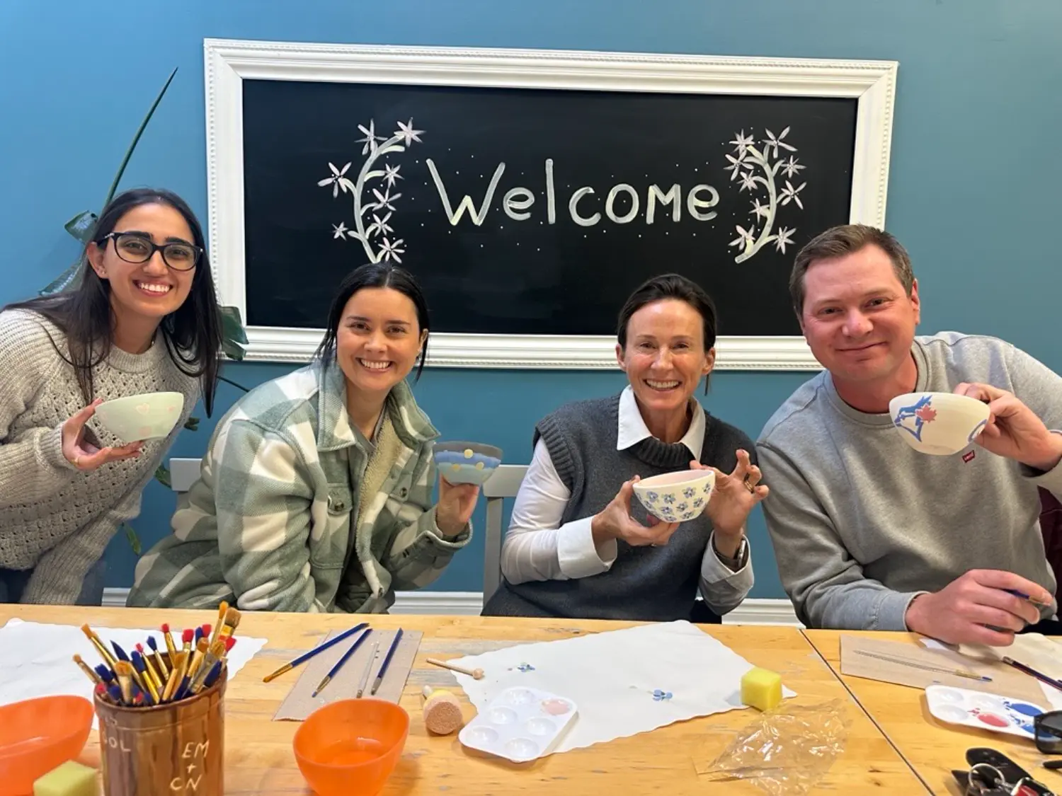 Painting for Empty Bowls Team members painted bowls at Crackpot Studio in support of Home Suite Hope’s Empty Bowls Event