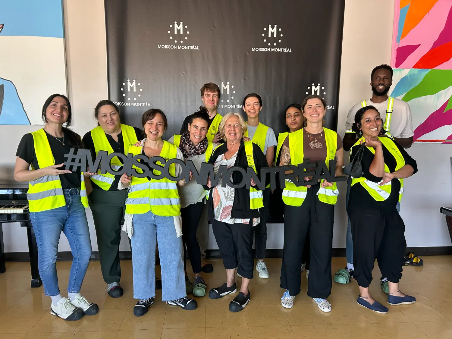 Ayming team volunteering with Moisson Montréal, supporting the local community through a hands-on day of giving back