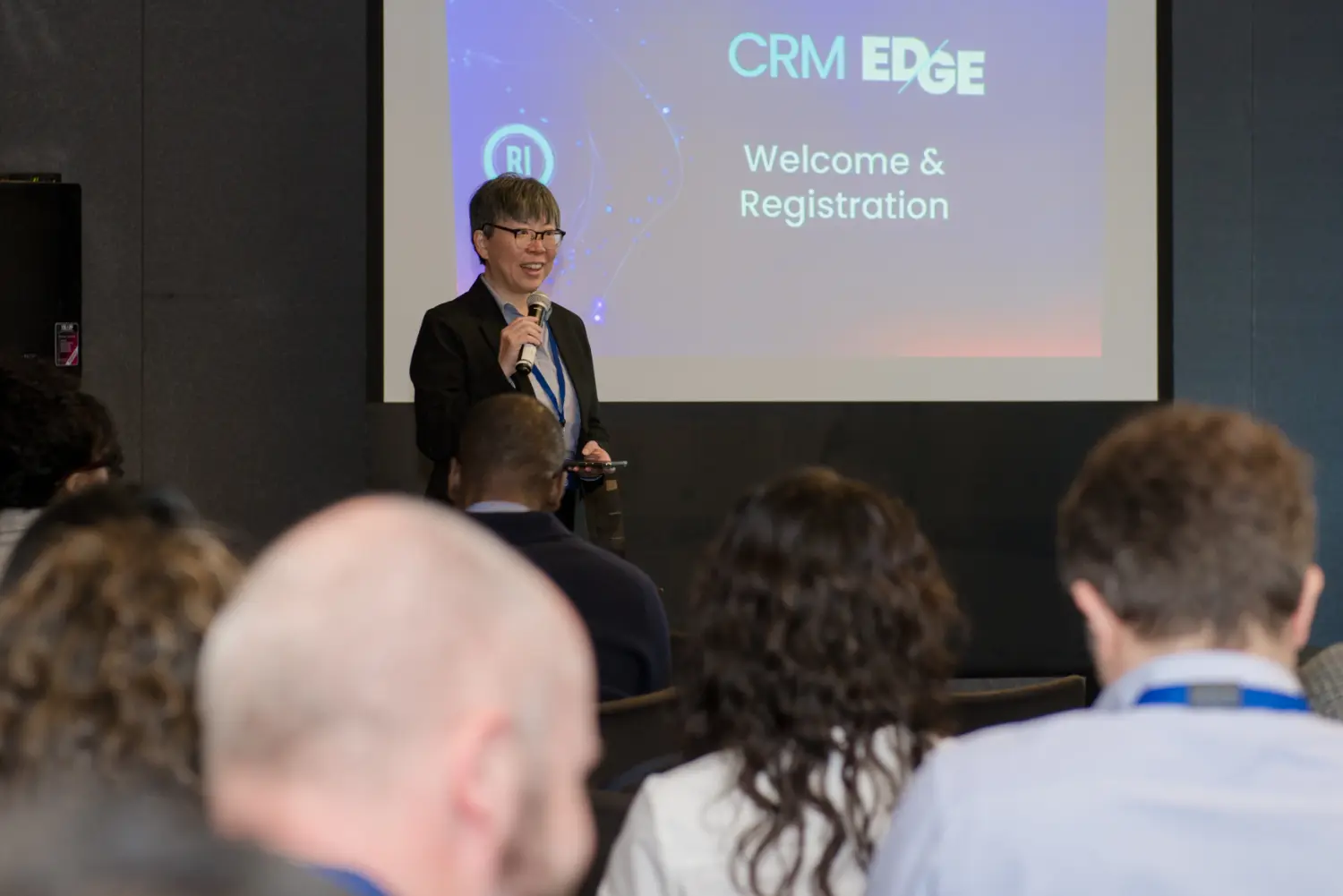 RI executive presenting at event