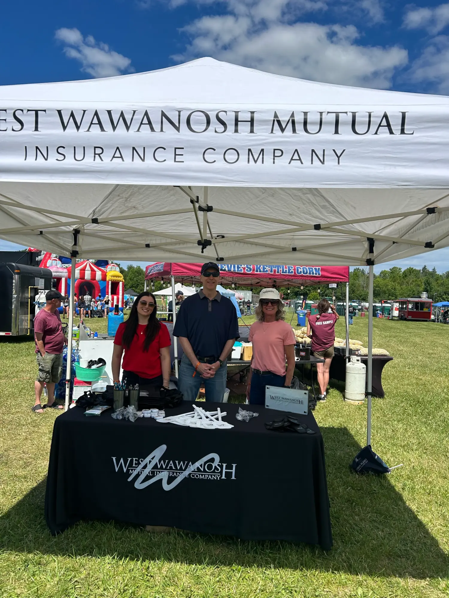 Staff manning the booth at the Dungannon Super Pull and Demo Derby