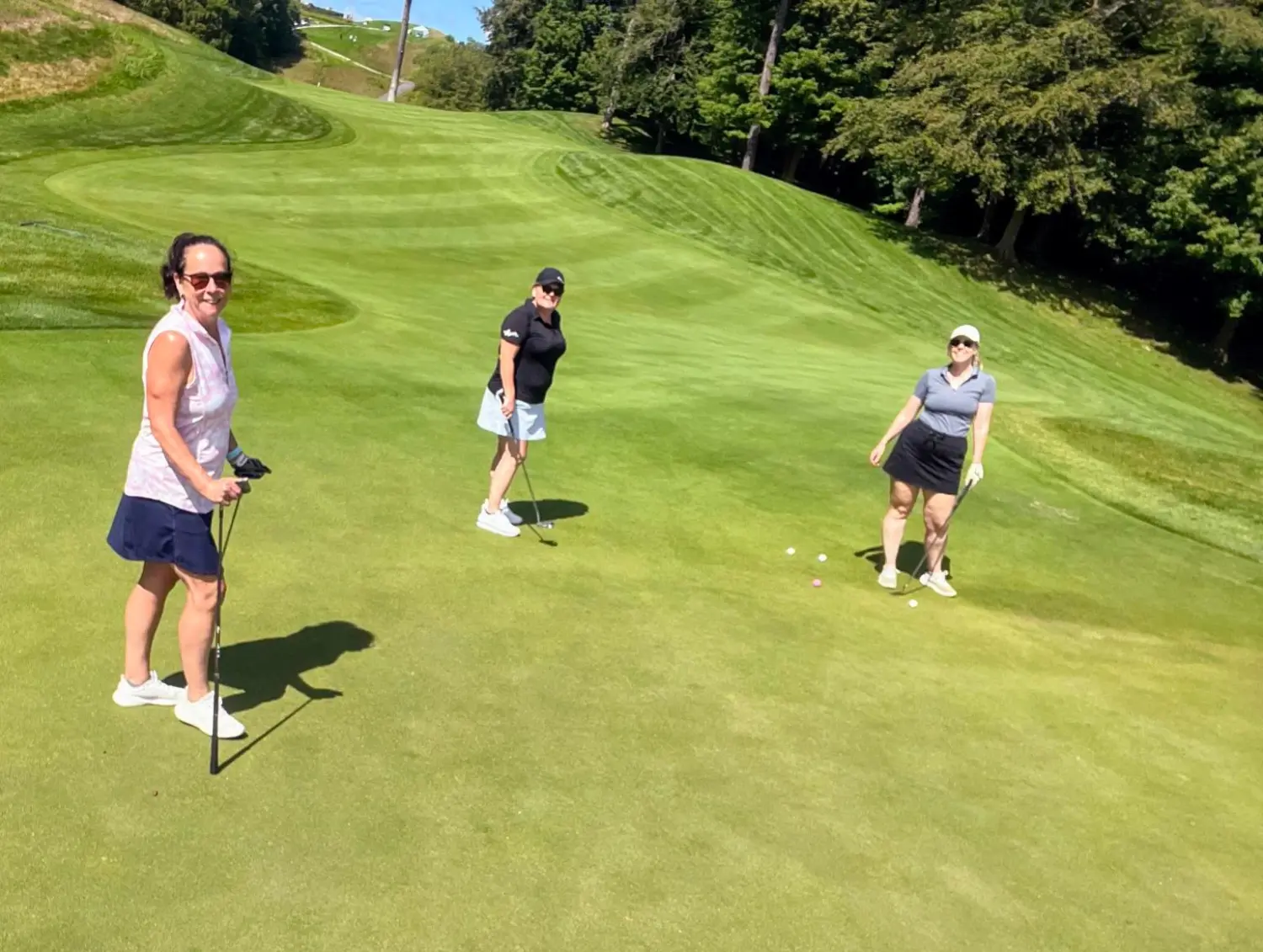 Staff attending a golf tournament