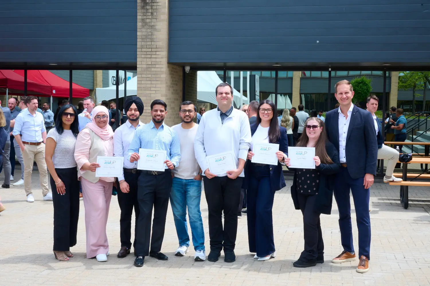 Winners of an internal challenge pictured with the General Manager and Director, Human Resources.