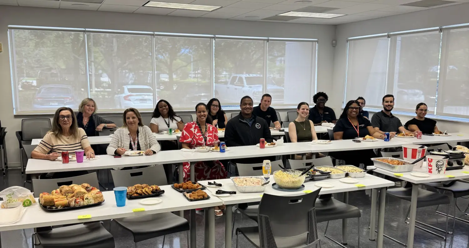 Sharing great food and company at our Boca Raton potluck!