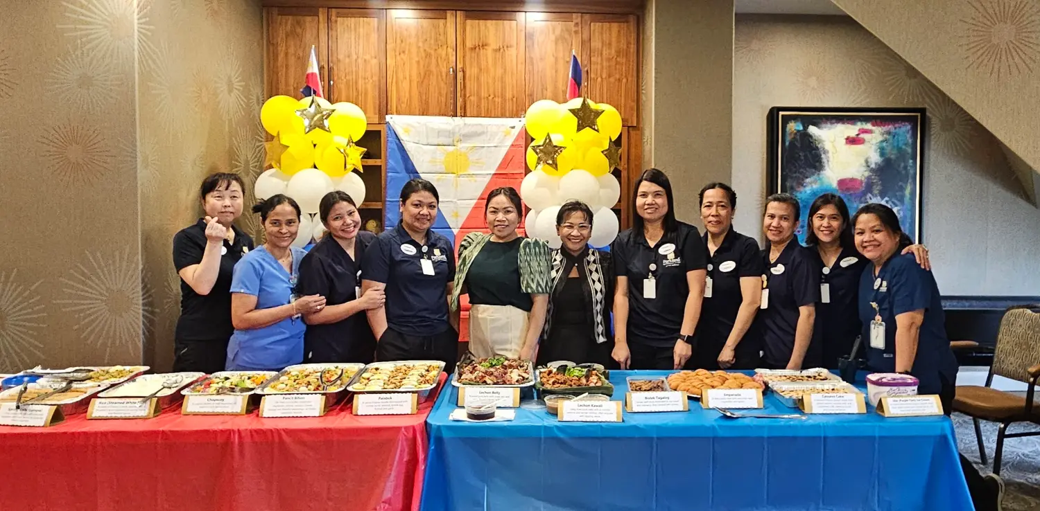 Employees celebrating Filipino Heritage Month at Parkland at the Gardens, one of our Retirement Living locations