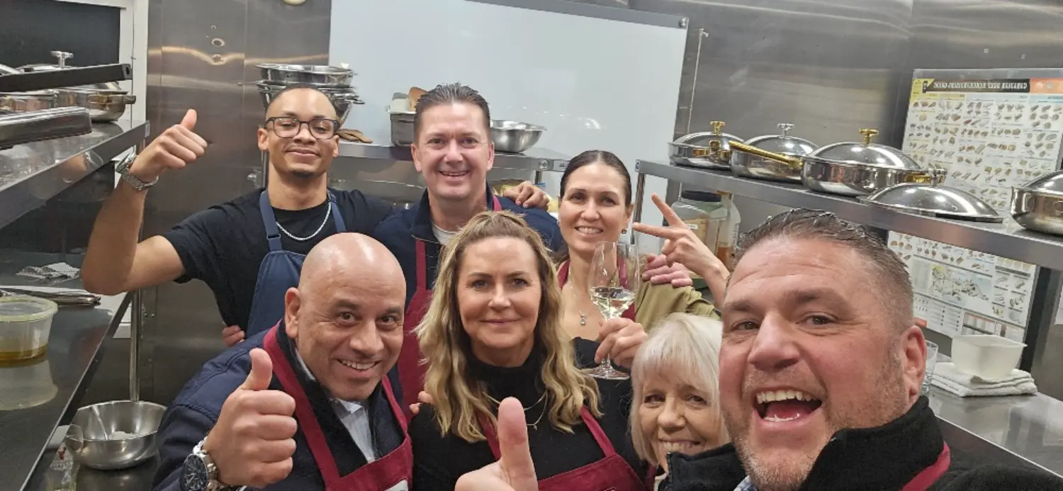 Leadership team working together to prepare and enjoy a meal! This is what teamwork and culture are all about!